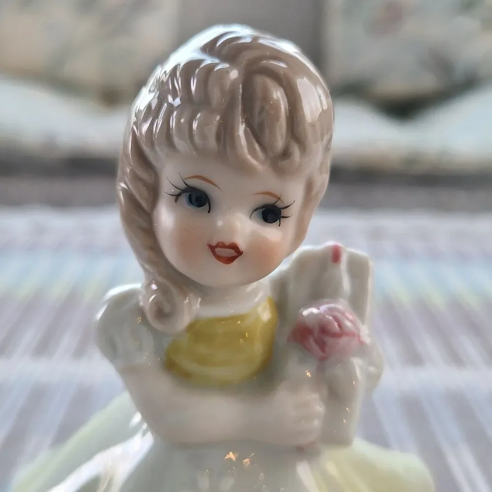 RARE Music Box Figurine With Lovely Young Girl Holding A Gift Plays Look Of Love